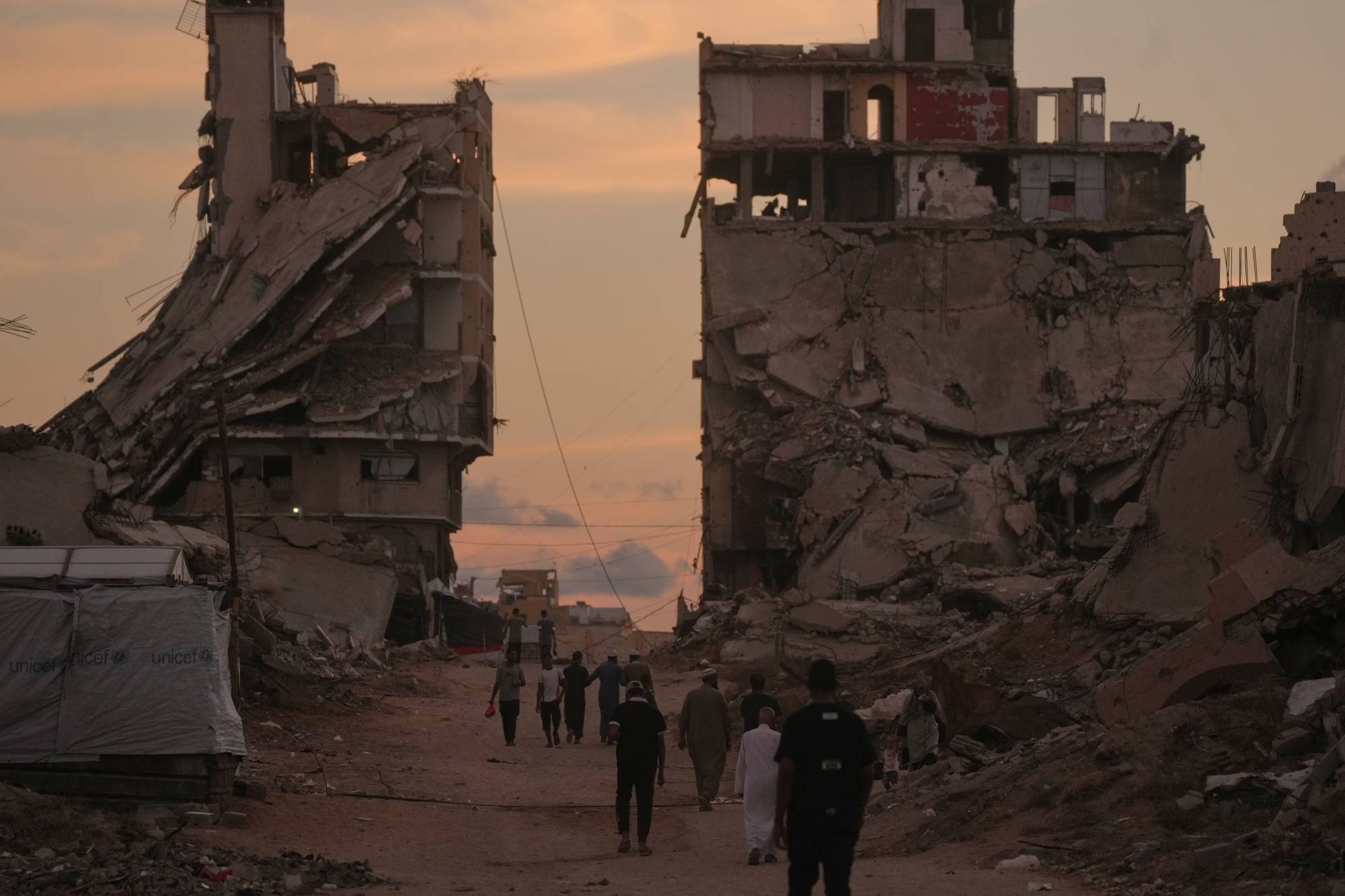 Gaza rescuers say Israeli strikes and gunfire kill seven
